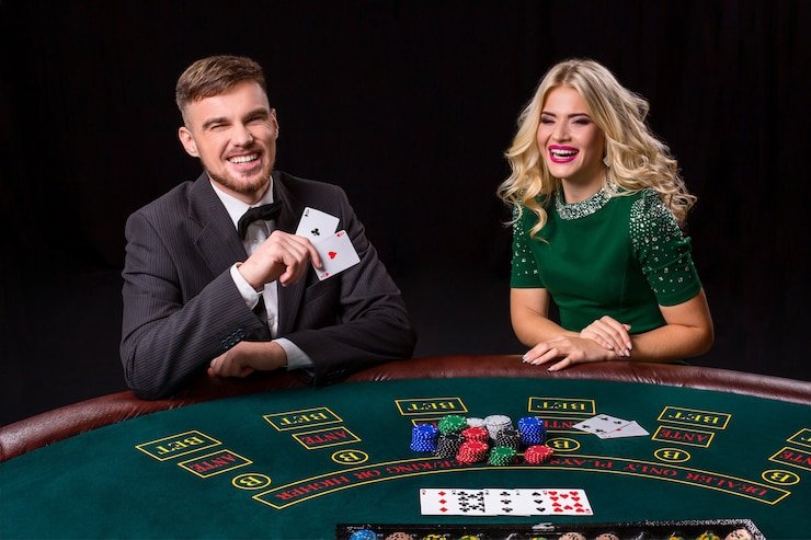 Live casino dealer interface with blackjack, roulette, baccarat tables